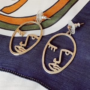 vintage, Art Deco-esque winky face earrings ;)